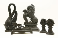 Lot 344 - Two Victorian cast iron doorstops: a lion and a swan