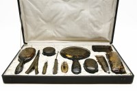 Lot 329 - An early 20th century Japanese tortoiseshell dressing table set