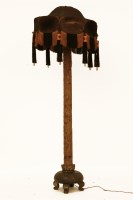 Lot 668 - A Japanese carved wood standard lamp