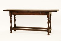 Lot 555 - A narrow 17th century style oak table