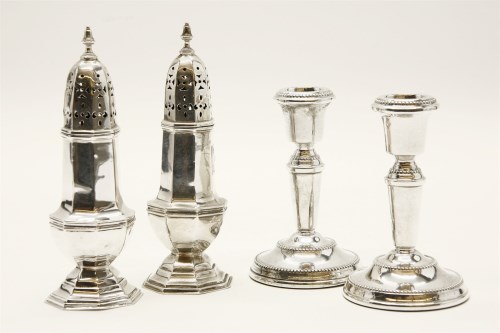 Lot 138 - A pair of silver sugar casters