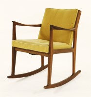 Lot 257 - A teak rocking chair