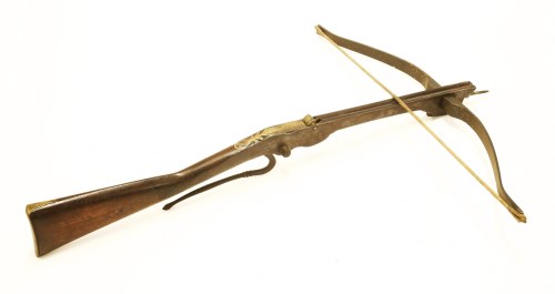 Lot 28 - A wooden and iron crossbow
