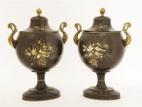 Lot 200 - A pair of painted tin urns and covers