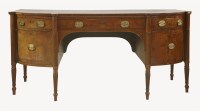 Lot 577 - A large George III strung mahogany bow front sideboard