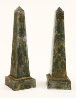 Lot 588 - A pair of variegated green marble obelisks