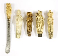 Lot 165 - Four ivory cutlery handles