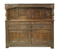 Lot 536 - An oak court cupboard