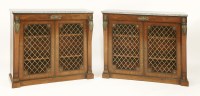 Lot 613 - Two Regency mahogany and gilt bronze mounted side cabinets