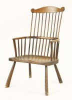 Lot 540 - A primitive ash and elm Windsor chair