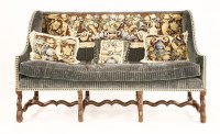 Lot 542 - A Louis XIV walnut sofa