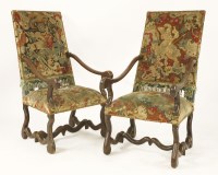 Lot 543 - A pair of French walnut armchairs