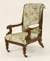 Lot 622 - A William IV carved oak metamorphic armchair
