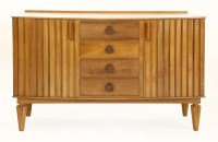 Lot 249 - A Gordon Russell teak and yew sideboard