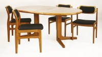 Lot 377 - A teak dining table