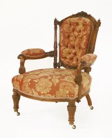 Lot 600 - A Victorian walnut open armchair