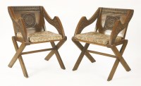 Lot 553 - A pair of oak Glastonbury chairs