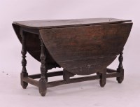 Lot 511 - A 17th century oak gateleg table