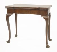 Lot 515 - A George III mahogany fold-over card table