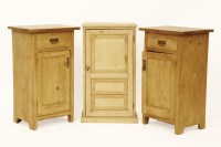 Lot 547 - A small pine single door cabinet