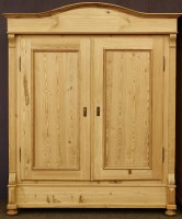 Lot 544 - A stripped pine armoire