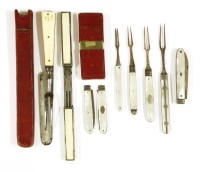 Lot 185 - A Georgian silver and mother-of-pearl handled folding fruit knife and fork set
