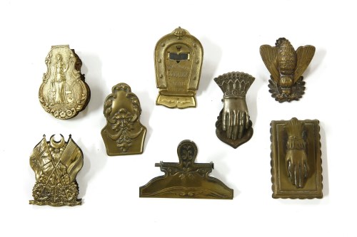 Lot 57 - Eight late Victorian and Edwardian brass letter clips