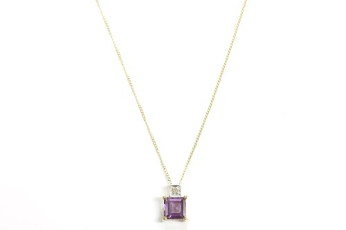 Lot 52 - An amethyst and diamond pendant