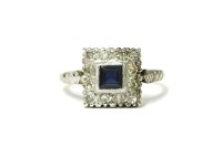 Lot 20 - An 18ct gold square cut sapphire and diamond cluster ring