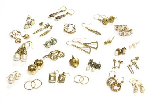 Lot 34 - A collection of twenty six pairs of earrings