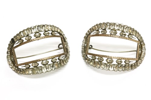 Lot 57 - A cased pair of silver paste stone curved buckles