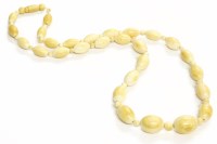 Lot 50 - A single row of graduating late 19th century barrel shaped ivory beads
