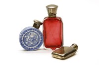 Lot 66 - Three scent bottles: the first composed of a double sided willow pattern pottery plate