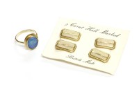 Lot 26 - A gold single stone opal doublet cabochon ring