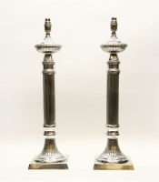 Lot 298 - A pair of silver plated reeded table lamps
