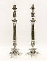 Lot 270 - A pair of silver plated empire style table lamps on triform base