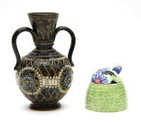 Lot 138 - A Doulton Lambeth twin handled vase