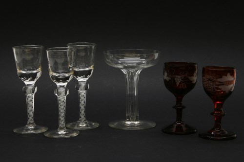 Lot 124 - A set of three  18th century cordial glasses