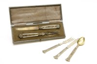 Lot 113 - A cased knife and fork import hall marked with blind fret work and mother of pearl handles