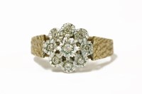 Lot 47 - A 9ct gold illusion set diamond cluster ring