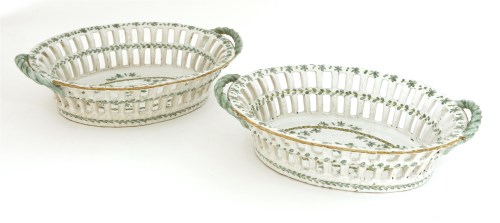 Lot 149 - A pair of tin-glazed earthenware chestnut baskets