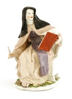 Lot 141 - A Chelsea porcelain figure of a nun holding a book