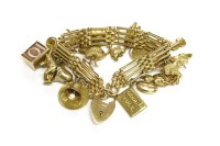 Lot 24 - A gold four row gate-link bracelet with padlock