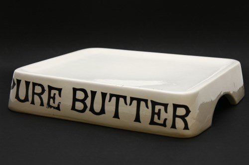 Lot 265 - A pottery 'pure butter' counter display tray