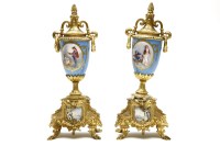 Lot 286 - A pair of Sevres porcelain and gilt 19th century side urns