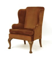 Lot 422 - A George III style walnut wing chair