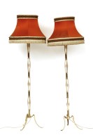 Lot 468 - A pair of brass standard lamps