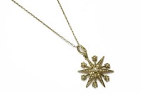 Lot 42 - A late Victorian gold split pearl star pendant on chain