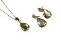 Lot 62 - A 9ct gold double sided mother of pearl and diamond drop pendant