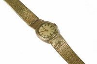 Lot 61 - A ladies 9ct gold Longines mechanical bracelet watch
